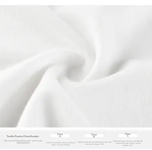 Close-up of high-density white cotton fabric showing texture and safety grade A detail