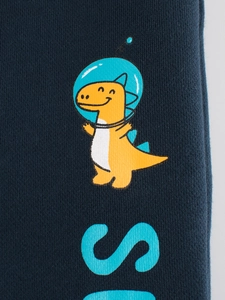 Navy blue cotton trousers with cartoon dinosaur astronaut print and knitted texture