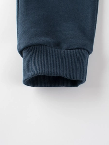 Kids navy blue knit trousers with high-quality ribbed cuffs and soft cotton fabric