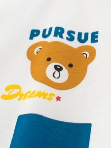 White cotton t-shirt for boys featuring a cartoon bear print and Pursue Dreams slogan