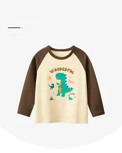 Detail of boys long sleeve raglan t-shirt with dinosaur print in soft cotton fabric