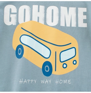 Detailed view of kids' blue T-shirt featuring a yellow cartoon bus print and text