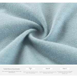 Close-up of sky blue ribbed knit fabric showing soft texture and high safety standards