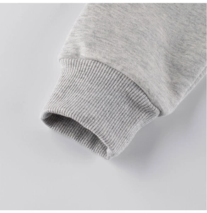 Close-up of classic ribbed cuffs on a grey cotton-blend sweatshirt for kids