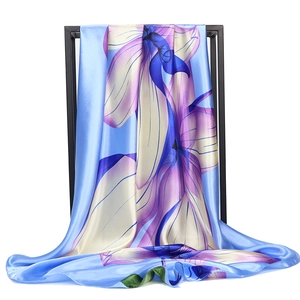 90cm satin silk square scarf featuring vibrant floral prints in blue and purple hues