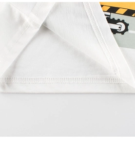 Detailed macro view of the double-stitched hem and fabric texture of child's cotton t-shirt