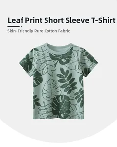 Detail of soft cotton kids T-shirt with tropical green leaf print and round neckline