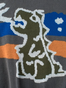 Toddler boys dark grey knit sweater featuring a colorful cartoon dinosaur jacquard pattern