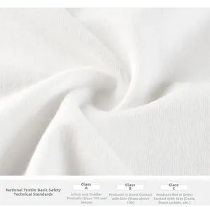 Macro view of soft white cotton fabric texture with textile safety standard details