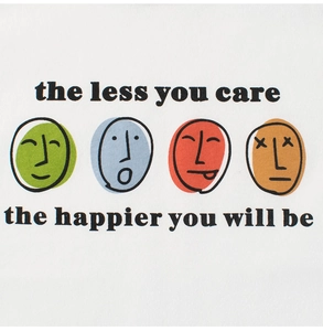 Detail of soft cotton white t-shirt featuring colorful faces and inspirational quote print
