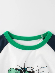 Kids dinosaur t-shirt with raglan sleeves and green ribbed crew neck detail