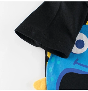 Detail of double-stitched sleeve cuff and blue cartoon dinosaur print on kids cotton T-shirt