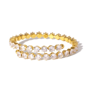 Elegant gold-plated spiral cuff bracelet with sparkling pavé crystals in a stackable design
