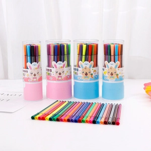 Detail of colorful watercolor marker set with vibrant pens and cute cartoon packaging