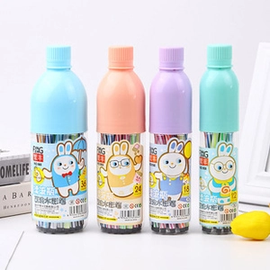 Detail view of soda bottle shaped double-ended watercolor markers in colorful cases