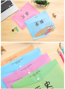 Detail of A4 subject file folders in transparent colors with secure snap button closure