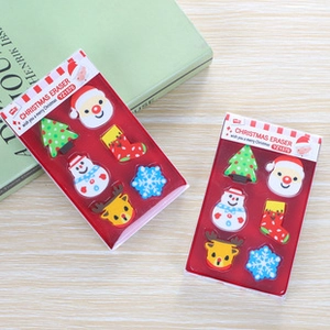 Close-up of 6-piece Christmas eraser set including Santa and snowman in retail packaging