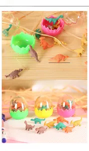 Detail showing 3.3cm mini dinosaur figures and colorful toy eggs for kids stationery