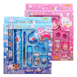Detailed view of the diverse stationery set including scissors and pens in plastic cases