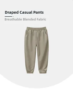 Detail of khaki breathable trousers with elastic waistband and high-quality drape fabric
