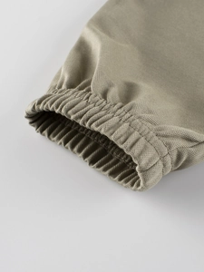 Olive green kids mosquito repellent pants with elastic cuffs in breathable woven fabric
