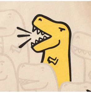Detailed macro view of cotton knit fabric featuring cute cartoon dinosaur prints
