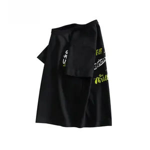 Detail of boys cotton black T-shirt showing side UFO print and The Thrill typography
