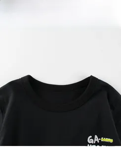 Detail of a black cotton crew neck T-shirt with high-quality GA-EARTH printed logo