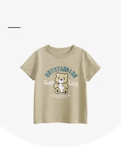 Detailed view of kids' cotton t-shirt with cartoon bear print and soft fabric texture