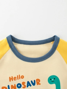 Maglietta bambini a maniche lunghe con dinosauro, maniche raglan gialle e girocollo