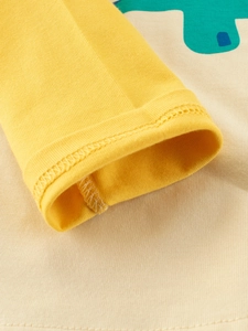 Maglia a maniche lunghe con dinosauro per bambini in cotone giallo e polsini rifiniti