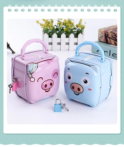Huchas de metal con forma de cerdo rosa y azul con asa, ranura para monedas y cerradura