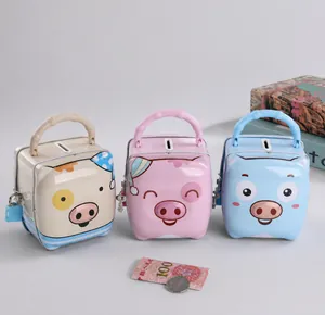 Detailed view of metal piggy bank with carrying handle and mini security padlock