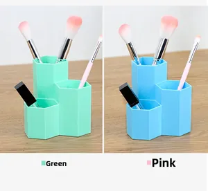 Three-slot hexagonal organizer showing tiered compartments in mint green and sky blue colors