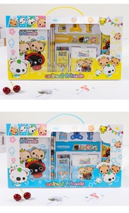 Detailed view of children stationery gift sets in blue and yellow with animal patterns