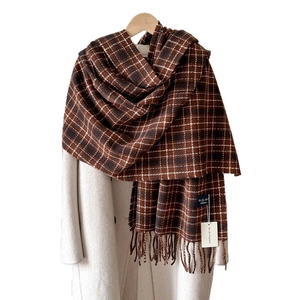 Classic brown plaid cashmere-feel scarf with fringes on beige wool coat for winter