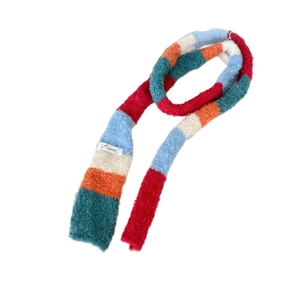 Rainbow striped colorful knitted scarf in soft mohair with fluffy texture on white background