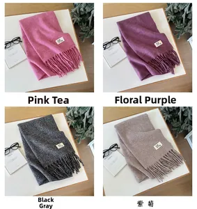 Close-up of fringe details and textures for thick wool scarves in four assorted colors