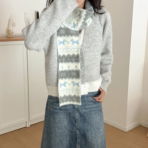 Fair Isle knit scarf with blue and white dog patterns for winter casual outfit