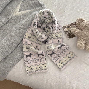 Close-up of pink and grey Fair Isle knit scarf with cute puppy patterns and paw prints