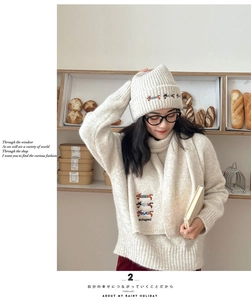 Beige wool knit hat and scarf set featuring colorful dachshund embroidery details