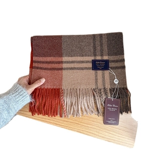 Classic British plaid wool scarf with tassels in brown and beige colors