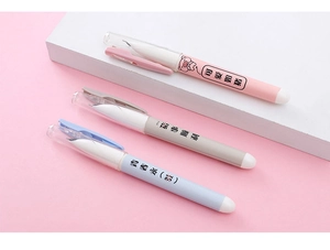 Detailed view of three pastel pens featuring cute cartoon pigs and frosted texture