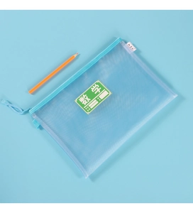 Close-up of blue mesh A4 document bag with green Math label and pencil on top