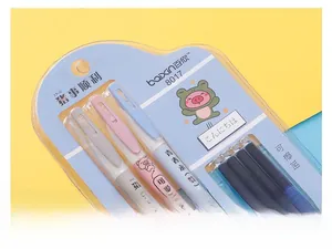 Close-up of three erasable cartoon pens with blue ink refills on a vibrant dual-tone background