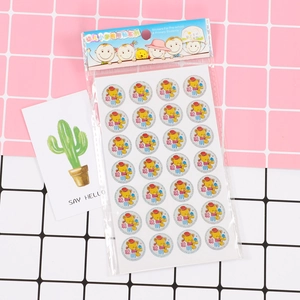 Detail of round reward stickers featuring cute cartoon bears and smart reward text