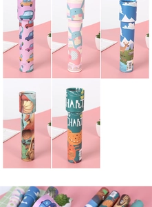 Macro view of cardboard kaleidoscopes featuring cartoon animal and dinosaur prints