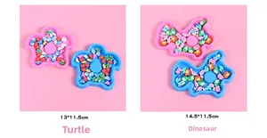 Detail of colorful turtle and dinosaur cartoon erasers in 13cm plastic trays
