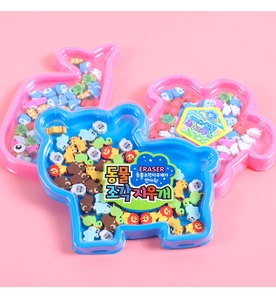 Detail of cute animal-shaped erasers in colorful bulk sets with pastel storage cases