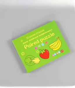 Détail du jeu de puzzle de 32 pièces sur les fruits et légumes dans sa boîte verte